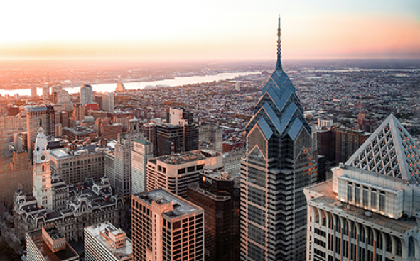 Ariel view of the Philadelphia skyline at sunrise.