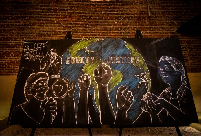 Mural depicting equity and justice