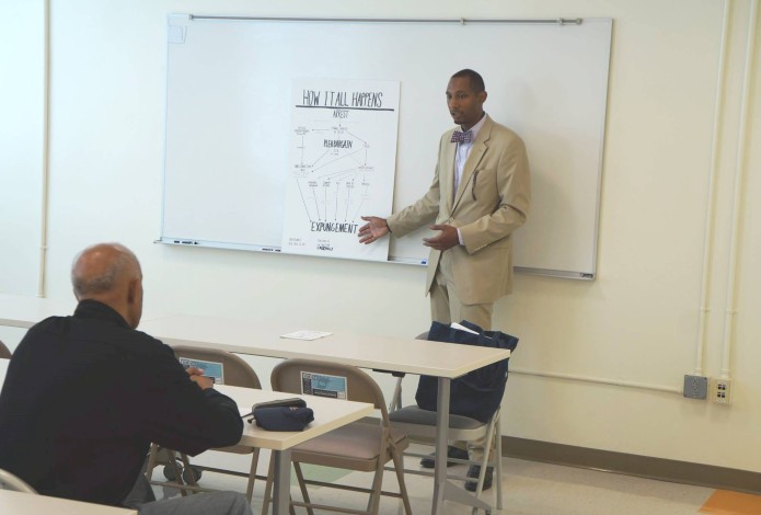 Lawyer standing at white board