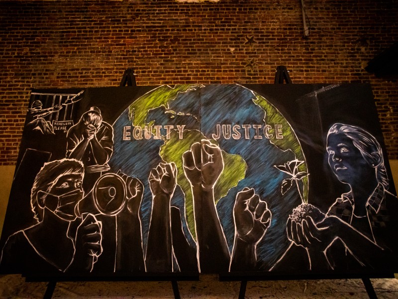 Mural depicting equity and justice