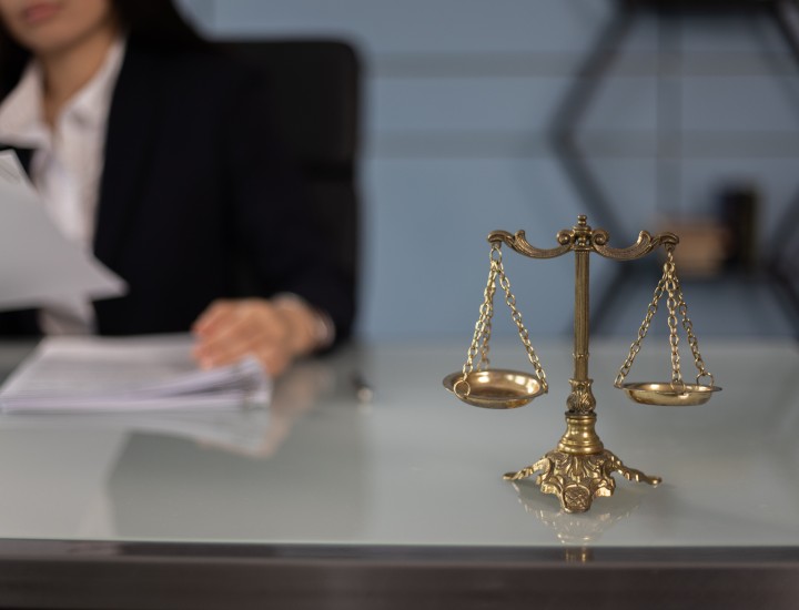Justice scales on lawyer's desk